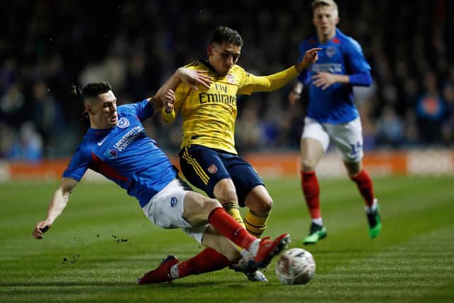 James Bolton made a crunching but fair challenge that forced Lucas Torreria off injured. Picture: ADRIAN DENNIS/AFP via Getty Images