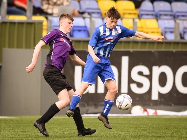 Action from the Portsmouth Youth League U15 Challenge Cup final between Bedhampton Youth (blue and white kit) and Gosport Falcons. Picture: Keith Woodland (190321-1467)