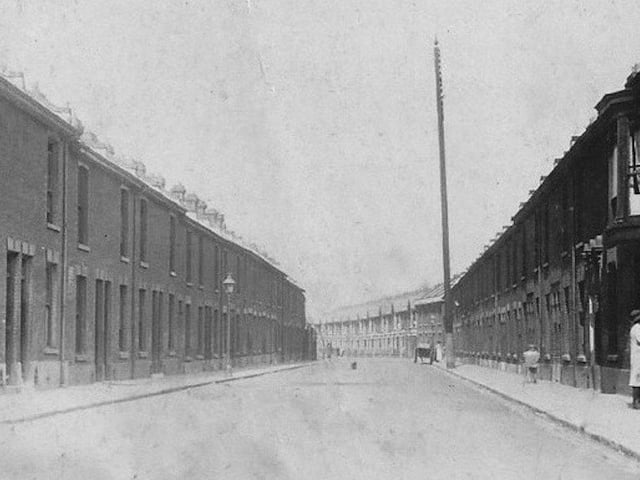 Newcomen Road, Stamshaw circa 1920. A view looking west down Newcomen Road, Stamshaw. Any clues to what the tall pole was in used for? Picture: David Gardener collection.