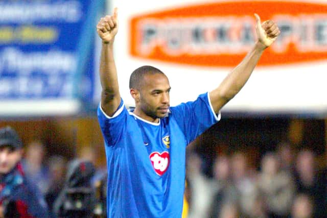 Arsenal's Thierry Henry in a Pompey shirt following the Blues' 1-1 draw with the Gunners in May 2004