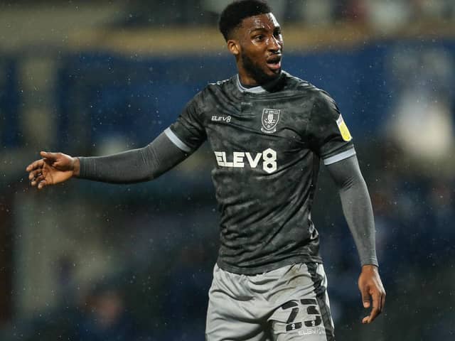 Shrewsbury have signed former Sheffield Wednesday defender Chey Dunkley.