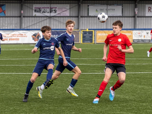 Action from the Under-14 Memorial Challenge Cup final between Pickwick Youth Pumas (all blue kit) and Horndean Youth Red. Picture: Mike Cooter