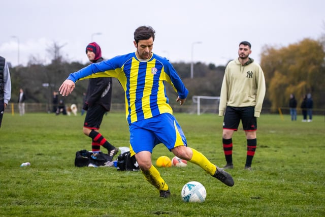 An AC FC (blue/yellow) player. Picture by Alex Shute