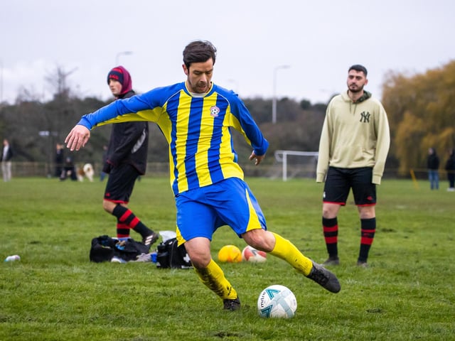 An AC FC (blue/yellow) player. Picture by Alex Shute