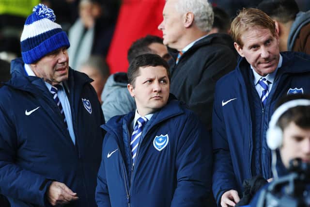 Andy Redman (centre) and Eric Eisner (right) are pencilled in to visit Fratton Park later this month - more than two years since their last trip. Picture: Joe Pepler