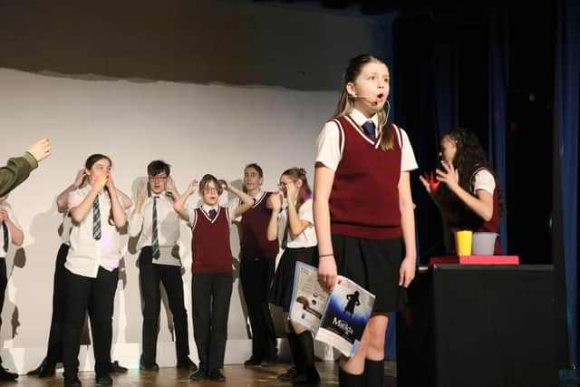 Faith, one of two pupils who played the role of Matilda, singing