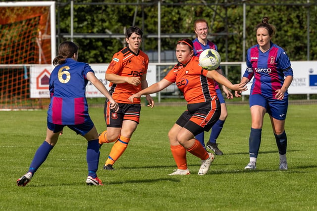 Portchester's Eilidh Currie and Hannah Walker surrounded by USP players. Picture: Mike Cooter