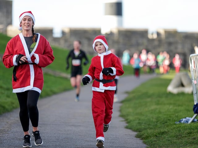 A number of runners took to the picturesque coastal route to take on the Portsmouth Coastal Waterside Marathon, Festive Half Marathon as well as the Southsea 5k and 10k Turkey Trot. Picture: Chris Moorhouse (221224-83)