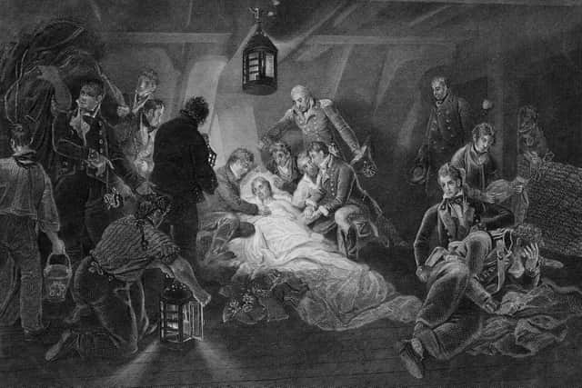 An engraving by William Holland, after an original painting by Arthur William Devis, shows a wounded Nelson being tended to in his final hours.