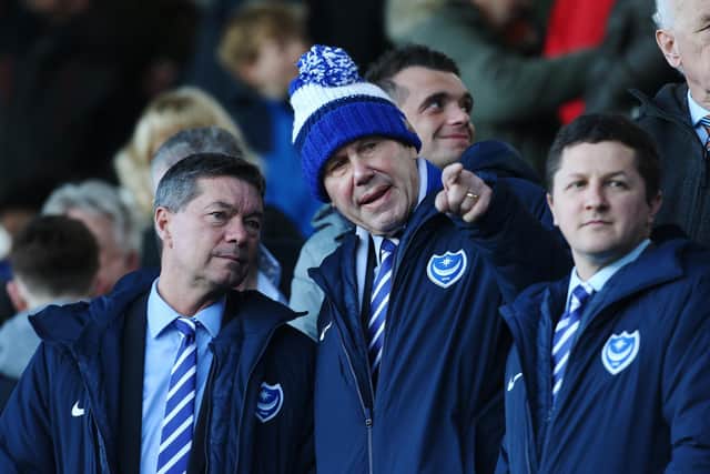 Pompey chairman Michael Eisner, centre, with Mark Catlin and Andy Redman at a Pompey game last season.