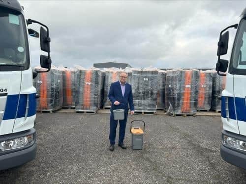 Cllr Bastable with new food waste collection vehicles and caddies to be delivered to Fareham Borough Council residents