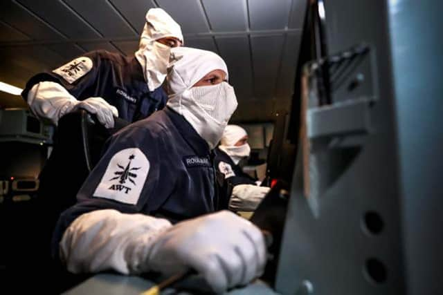 Sailors were kitted out in full protective gear as they carried out their training drills on HMS Dragon. Photo: Royal Navy