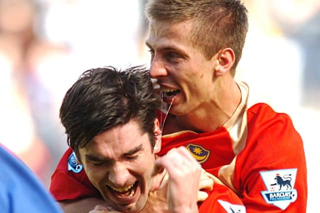 Gary O'Neil celebrates with Richard Hughes after sealing the Great Escape at Wigan in April 2007. Picture: Neal Simpson, EMPICS Sport/PA Photos