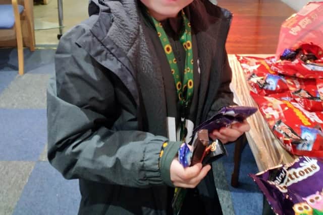 Rogan helping out while wearing his team's colours proudly