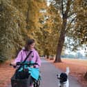 Lucy, who is profoundly deaf, out and about with her hearing dog Wilbur.