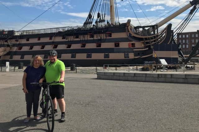 Kevin Jones, right, outside HMS Victory. Picture: Jubilee Sailing Trust