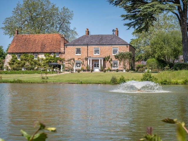 This property comes with nine bedrooms, seven bathrooms and five reception rooms.