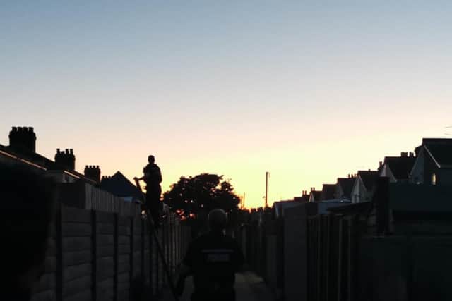 Officers searched for the man hiding in someone's back garden in Old Road, Gosport. Picture: Gosport police.
