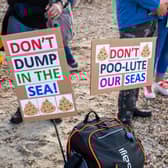 Protest signs at Southsea Beach during a 2021 protest against Southern Water Picture: Mike Cooter (161021)