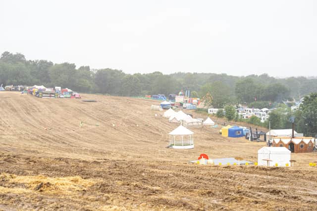 The main field, left empty as the opening time was put back due to the rain. Picture: Andy Hornby