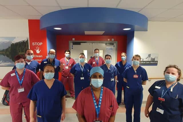 Firefighters from Hampshire Fire and Rescue Service with doctors and nurses from the Intensive Care Unit at Queen Alexandra Hospital in Portsmouth.