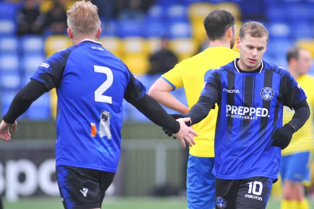 Olly Long, right, has just scored for Clanfield. Picture: Martyn White