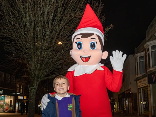 Otto, 6, meets The Elf at the Waterlooville Christmas light switch on. Photos by Alex Shute