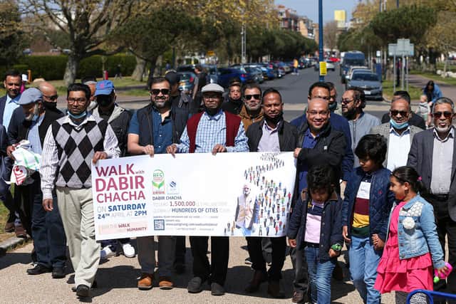 Walkers for Dabirul Islam Choudhury raising funds for victims of Covid-19 in the UK, Bangladesh, Pakistan and 45 more countries, pictured at the D-Day Museum, SouthseaPicture: Chris Moorhouse (jpns 240421-25)