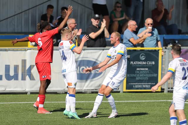 Scott Rendell celebrates with Joe Newton after scoring Hawks' second goal against Welling. Picture: Dave Haines