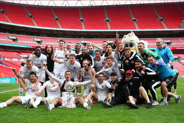 AFC Flyde celebrate after winning the FA Trophy final in 2019 - 11 years after their predecessors, Kirkham & Wesham, lifted the FA Vase. Photo by Jordan Mansfield/Getty Images.