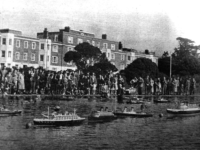 Model ships of all kinds watched by a vast audience at Canoe Lake, Southsea.