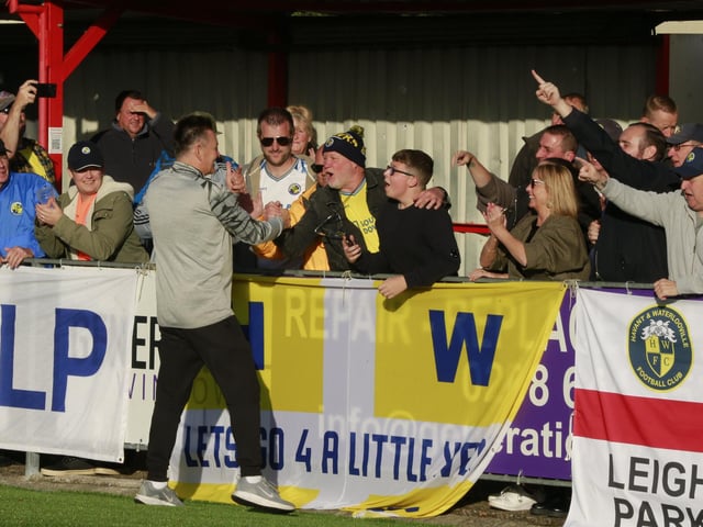 Hawks boss Paul Doswell with fans after the final whistle. Picture by Dave Haines