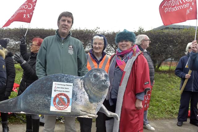 Pictured is: (l-r) Andy Ames, Hampshire & Isle of Wight Wildlife Trust, Jeanette (74) from Southsea, and Debbie Garrod from Langstone.

Picture: Sarah Standing (241122-6993)