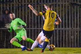 Moneyfields striker Steve Hutchings sees a shot deflected wide in last night's Wessex Premier derby win against US Portsmouth. Picture: Martyn White.