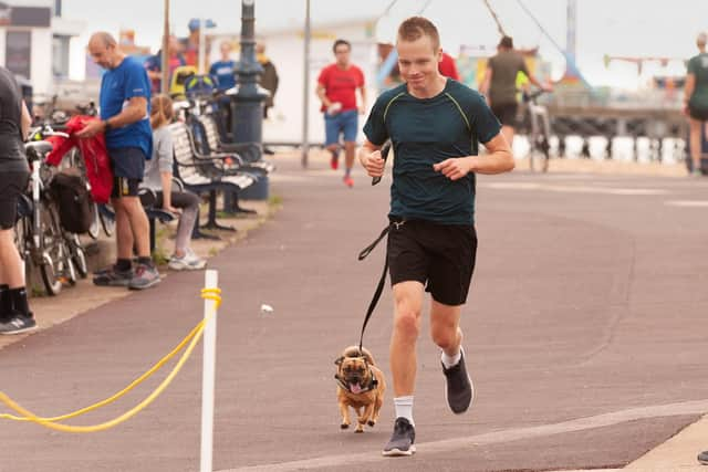 Tom Raynor with Poppy

Picture: Keith Woodland