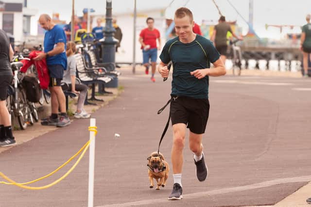 Tom Raynor with Poppy
Picture: Keith Woodland