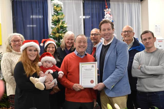 Lifehouse receive the Freedom of the City Award.
Pictured, left to right: Hilary Lockhart (Breakfast Chef), Hannah Cooper (Venue Team Manager and Margot's Mum), Baby Margot, Maggie Aquilina (Dining Room Supervisor), Helen Robinson (Pastor), Mike Morell (LifeHouse Manager & Trustee), Raf Hrabal (Director Kanon Foodshare Pantry, Copnor), Chris Atwell (Local Councillor), Pat Jolly (LifeHouse Security) and Karl March (Breakfast Chef).