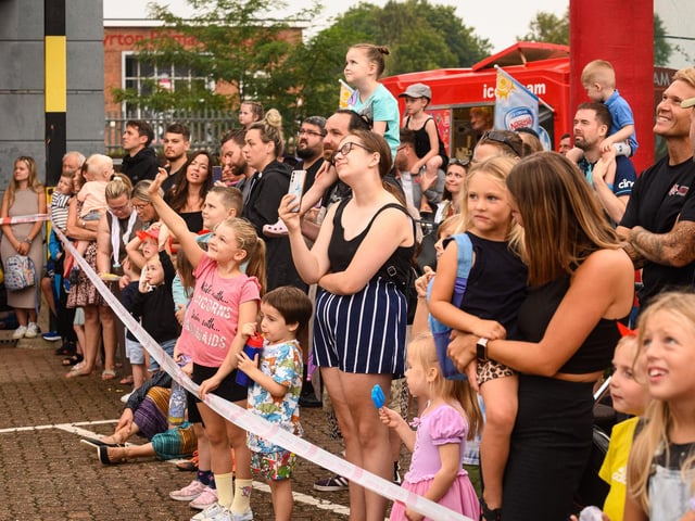Pictured is: Visitors to the day watch Blaze the bear rescued.Picture: Keith Woodland (100921-49)