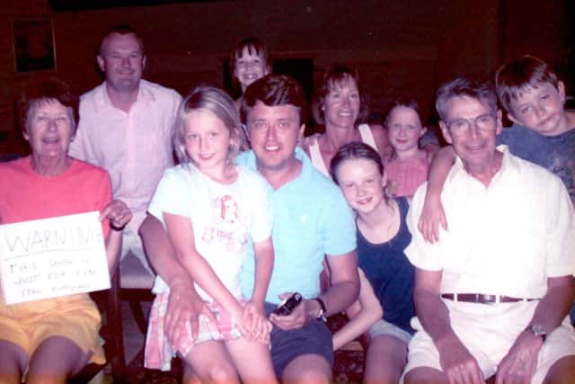 Former Portsmouth GP Colin Arnold (right) picturerd with his family in 2004. Picture: Ann Arnold