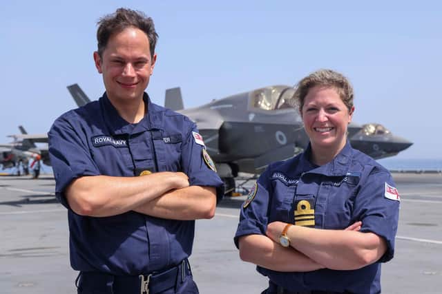 Pictured: Lt Cdr Jeremy Olver and Lt Cdr Alex Harris in front of an F35B Jet on the flight deck of HMS Queen Elizabeth.
Lt Cdr Alex Harris and Lt Cdr Jeremy Olver both attended Newbridge Junior School in Bath in the early 1990s. They have been reunited almost 30 years later onboard HMS Queen Elizabeth where they both serve on the staff of Commander UK Carrier Strike Group
