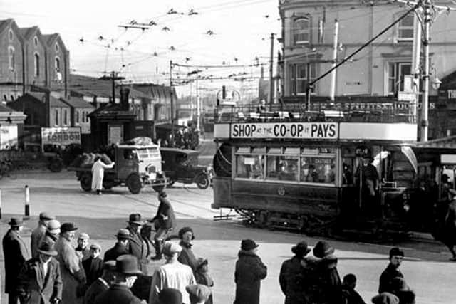 A tram, or ‘cars' as they were always called, heads for Greetham Street from Guildhall Square. Picture: The News archive