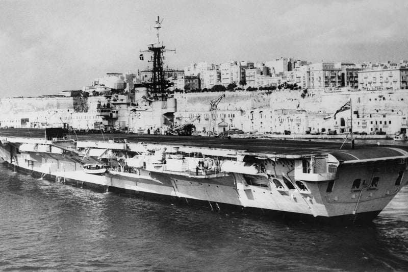 The Royal Navy Centaur class light fleet aircraft carrier HMS Hermes steams into the Grand Harbour of the Port of Valetta naval base on 20 March 1967 in Valetta, Malta.