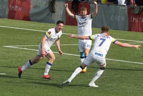 James Roberts celebrates after grabbing his second goal in Hawks' victory over Hampton & Richmond Picture: Dave Haines