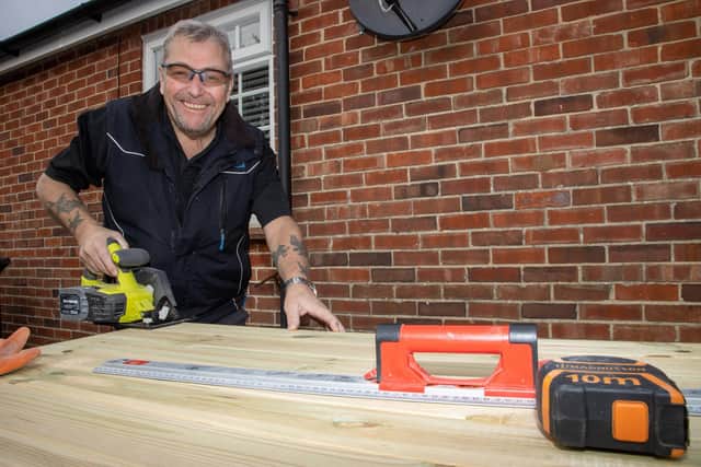 John Cowey, owner of Home Services Inside and Out, will soon be making the new venture his full time job. Photos by Alex Shute