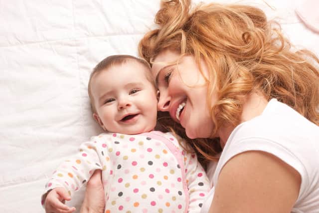 A mother and her baby. Picture posed by models
