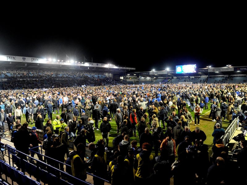 A predictable pitch invasion after Pompey were crowned League One championsPicture: Sarah Standing (160424-7786)