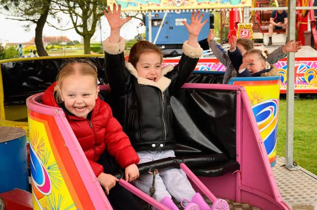 Southsea Travelling Funfair is proving popular with locals. The funfair is currently on Castle Field, Southsea, and will be there until May 6, 2024. Pictured is: Jexie Jones and Willow Grace enjoy the ridesPicture: Keith Woodland (270421-68)