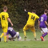 Splashing about - Co-op Dragons (yellow) v AFC Hilsea. Picture by Kevin Shipp