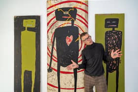Ian Parmiter in his exhibition at Art Space in Brougham Road. Picture: Mike Cooter (081022)