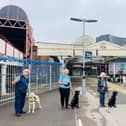 Puppy raisers Joe, Tina, Sue and Jacki with their puppies at the station